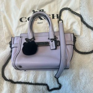 Limited edition Ariana Grande x Coach kitty swagger